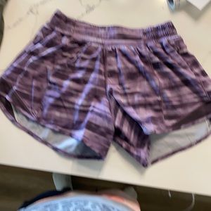 Lululemon Hotty Hot LR  short 4” lined. Has zippered side pocket, Purple
